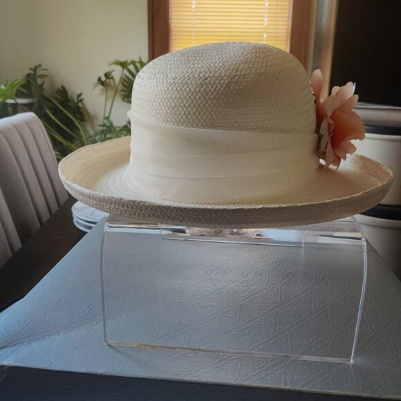 White Summer Straw Hat with a pink floral spray and a gossamer ribbon 12.5\